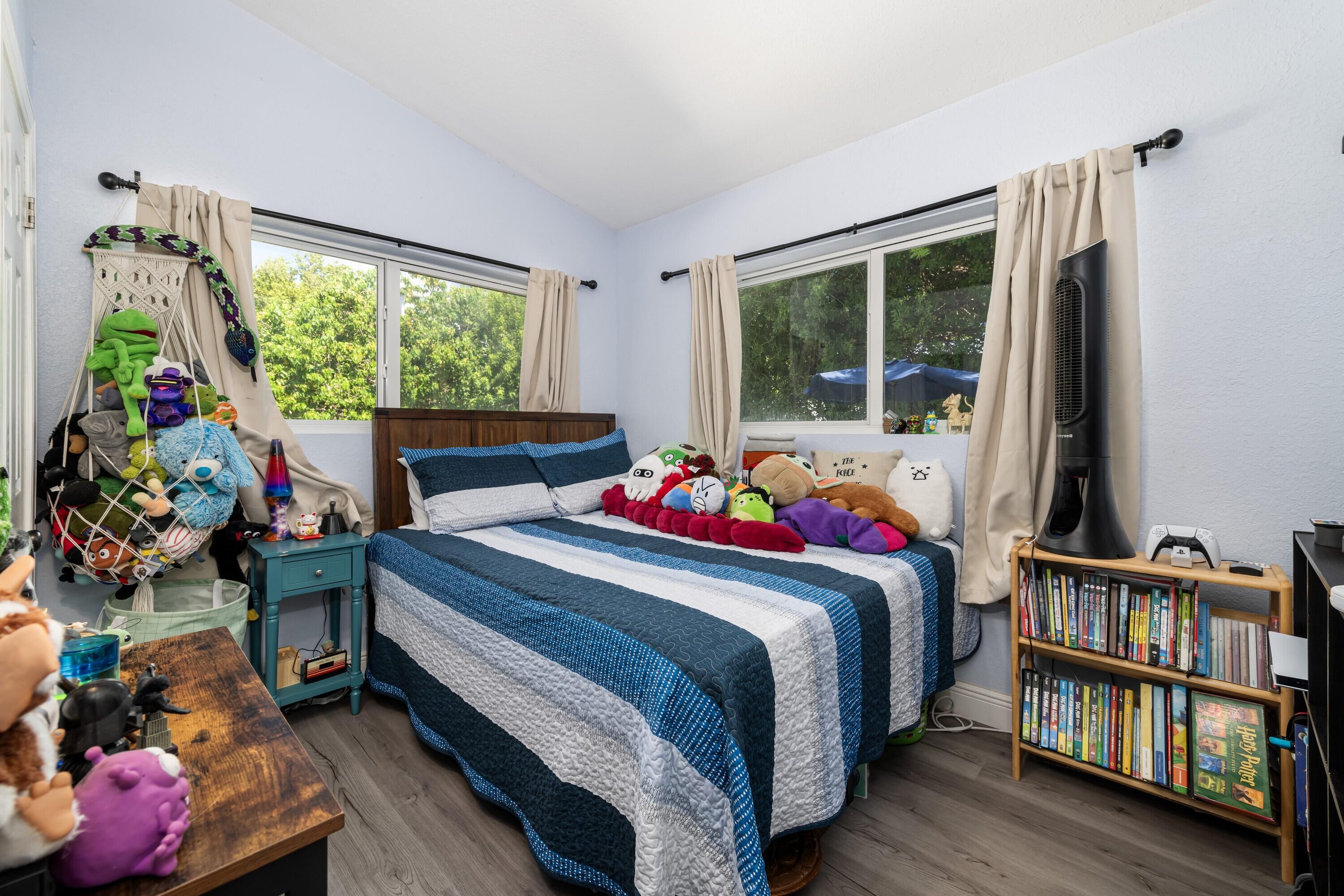 423 80th Street Marathon, FL 33050 - Photo 20 of 39 a bed room with a bed and a window