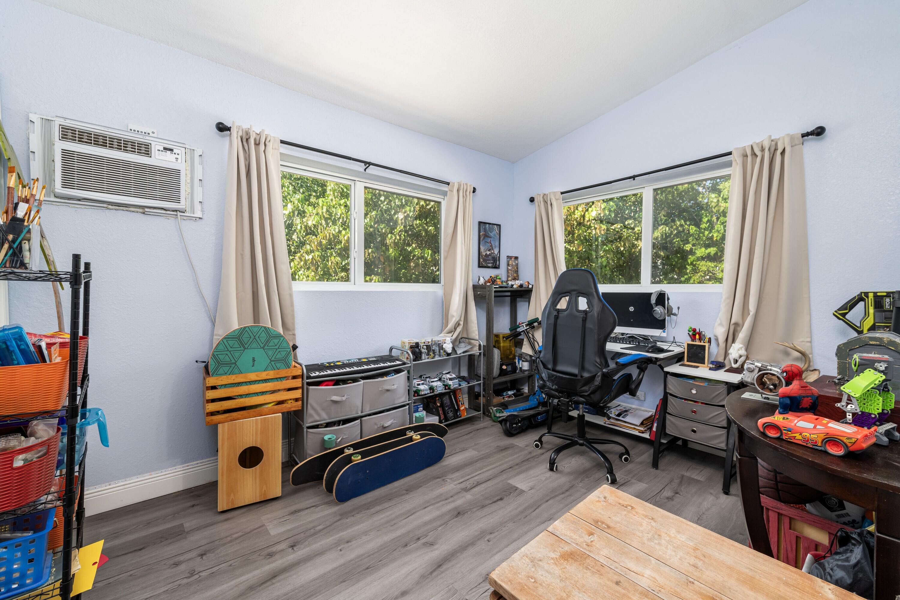 423 80th Street Marathon, FL 33050 - Photo 28 of 39 a living room with furniture and a wooden floor