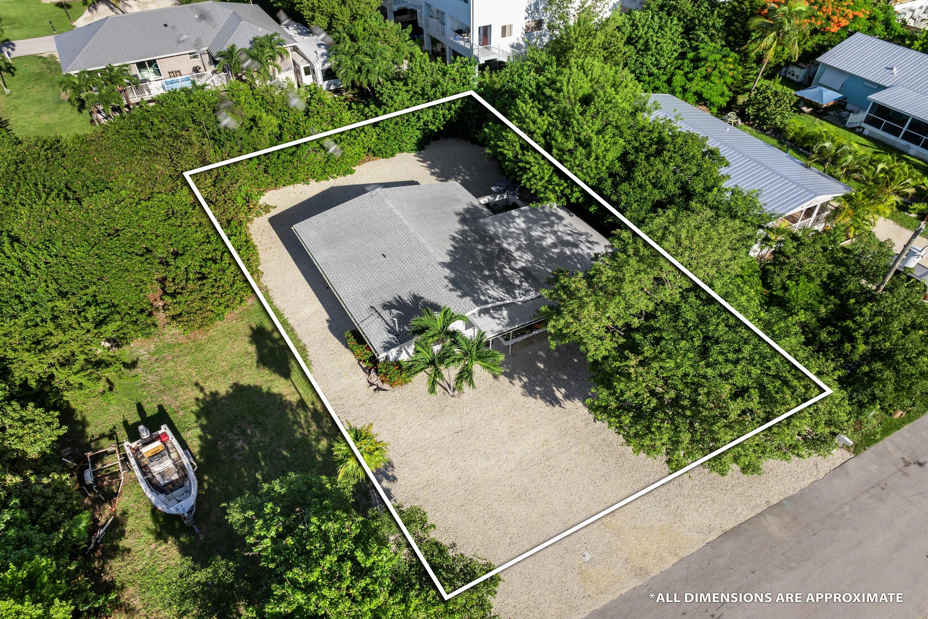 423 80th Street Marathon, FL 33050 - Photo 6 of 39 an aerial view of a house