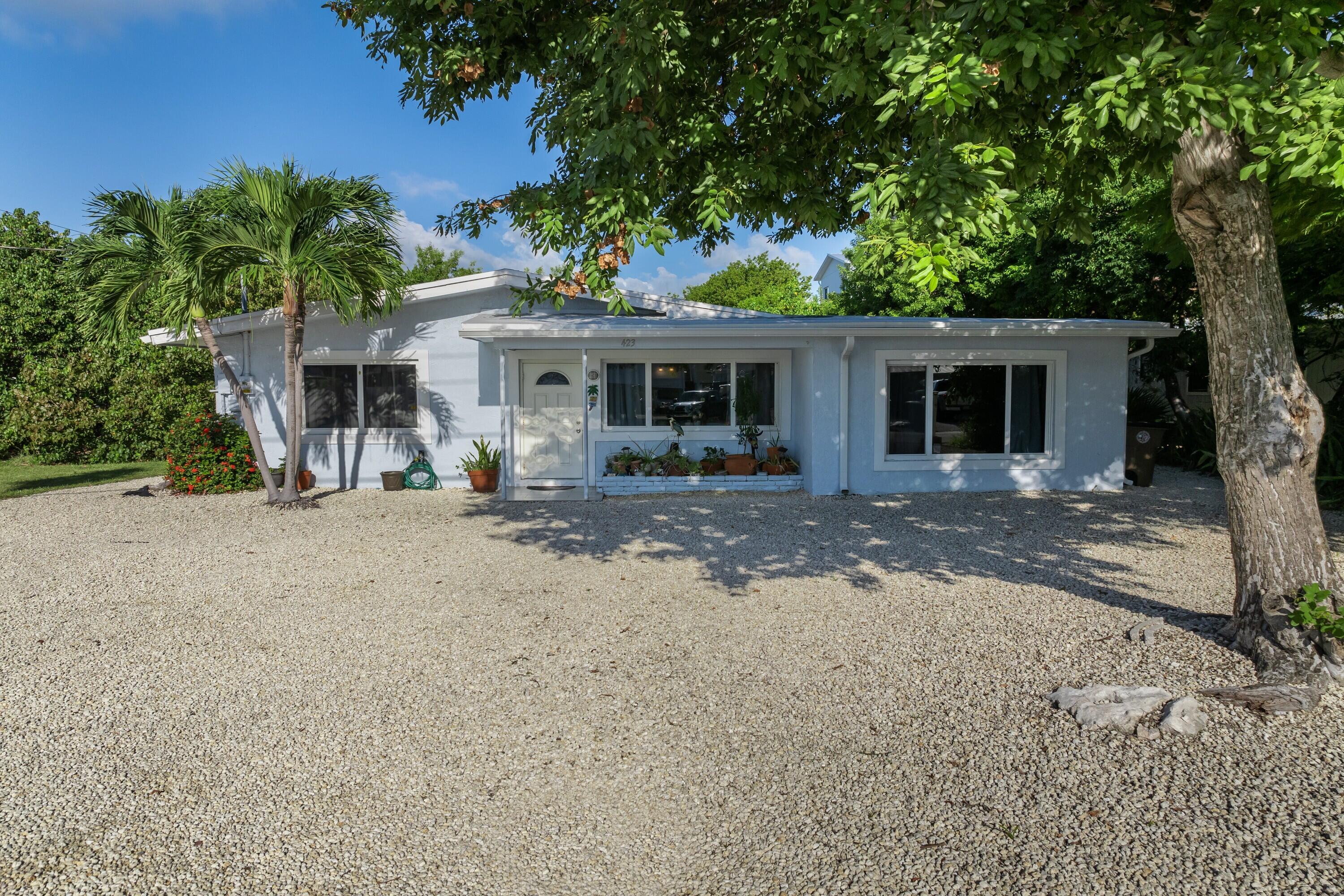 423 80th Street Marathon, FL 33050 - Photo 8 of 39 a view of a house with a patio