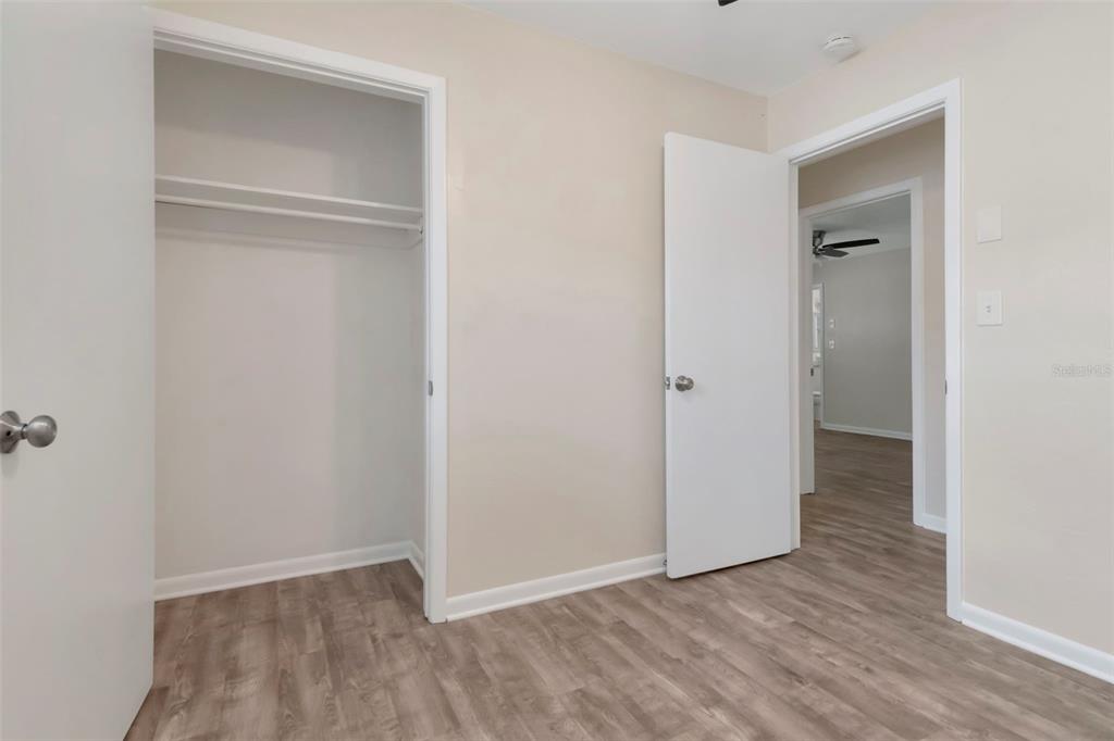 126 Kingsway Road Brandon, FL 33510 - Photo 26 of 42 a view of an empty room with closet and a window