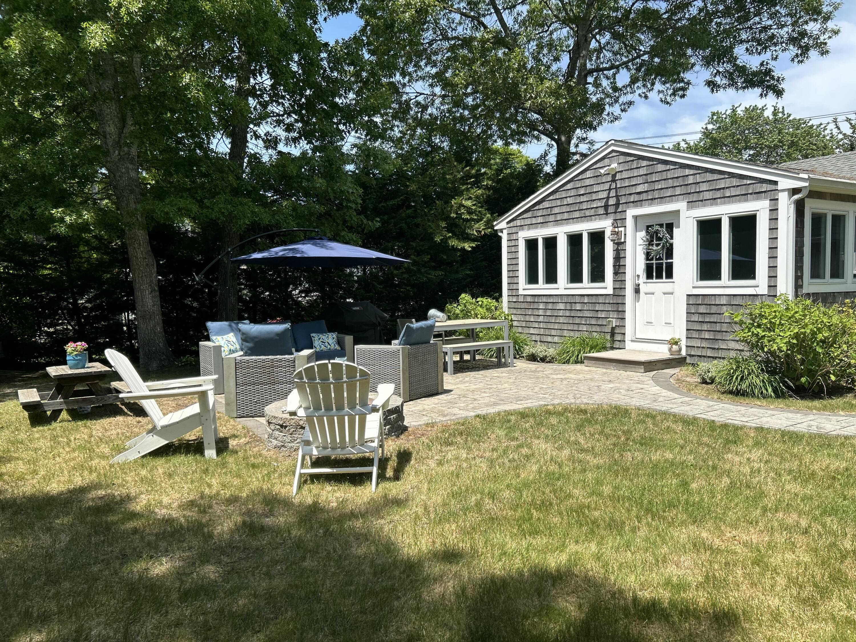 157 Wading Place Road Mashpee, MA 02649 - Photo 30 of 56 157 bwading place side yard 2
