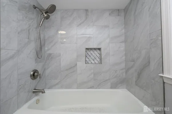 a bathroom with a bathtub