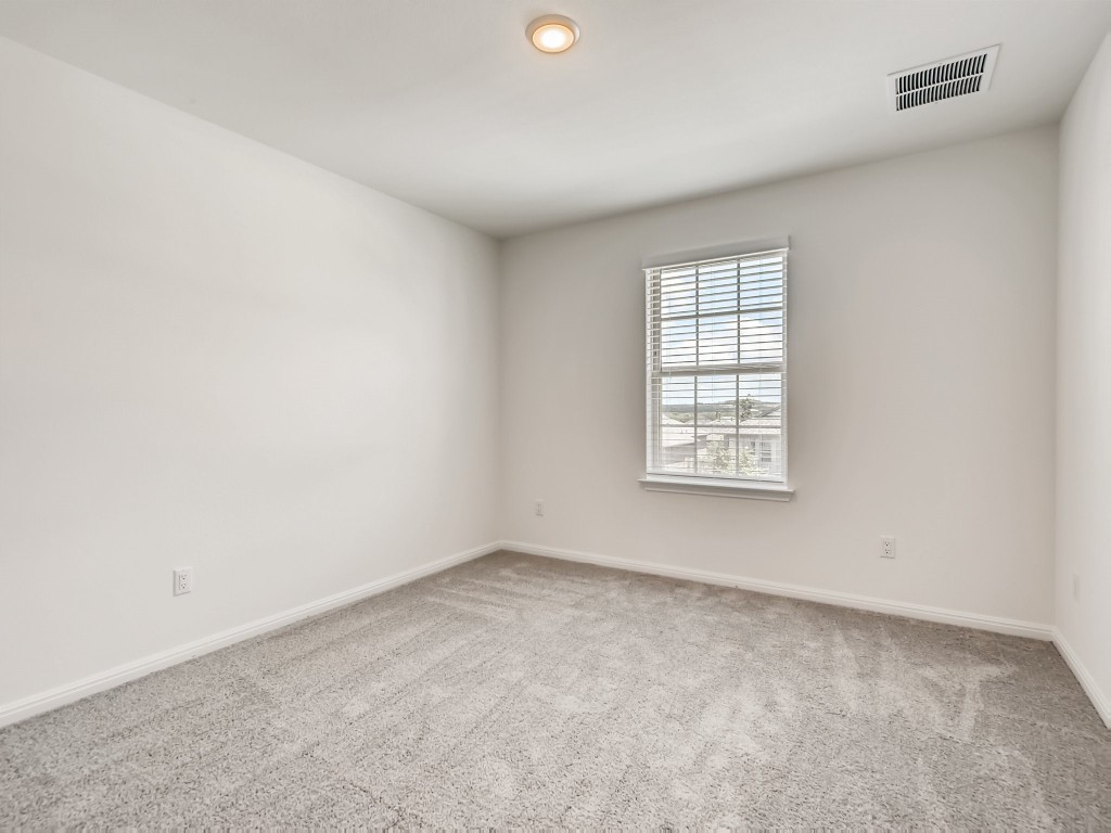 334 Pecos River Crossing Dripping Springs, TX 78620 - Photo 20 of 28 an empty room with a window