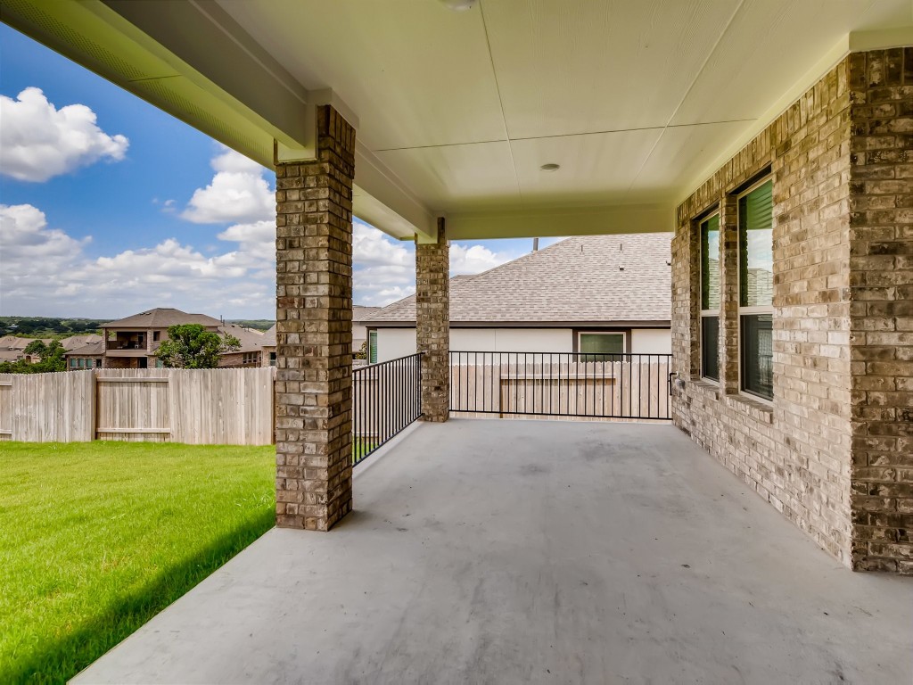 334 Pecos River Crossing Dripping Springs, TX 78620 - Photo 25 of 28 a view of a porch with a yard