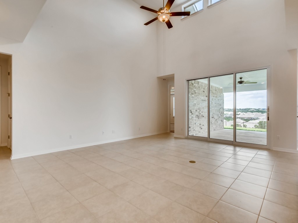 334 Pecos River Crossing Dripping Springs, TX 78620 - Photo 5 of 28 a view of an empty room with a window