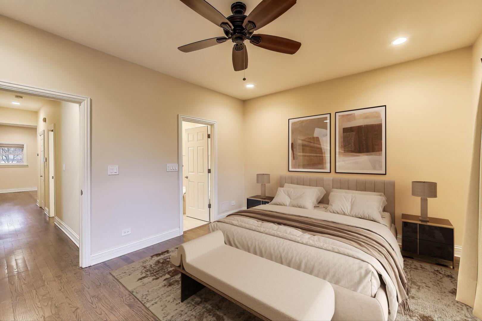 4432 North Dover Street, Unit 1S Chicago, IL 60640 - Photo 11 of 30 a bedroom with a bed and a chandelier