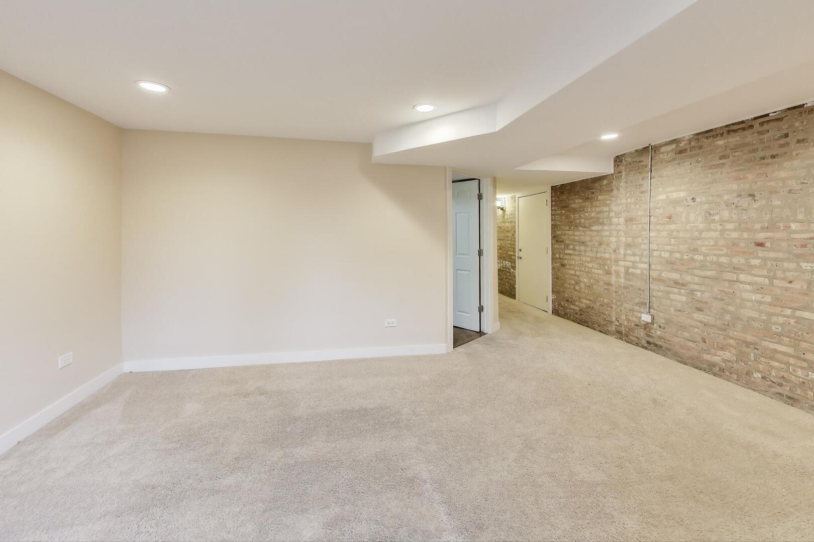 4432 North Dover Street, Unit 1S Chicago, IL 60640 - Photo 23 of 30 a view of an empty room