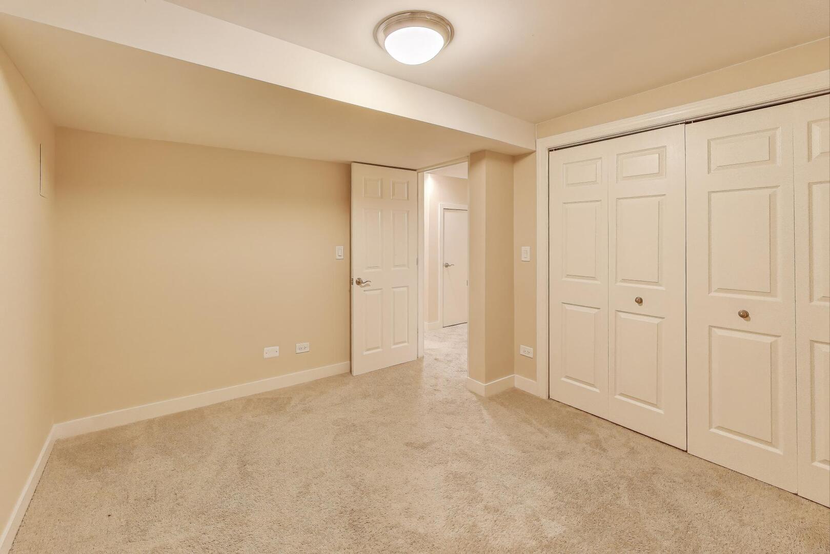 4432 North Dover Street, Unit 1S Chicago, IL 60640 - Photo 25 of 30 a view of an empty room