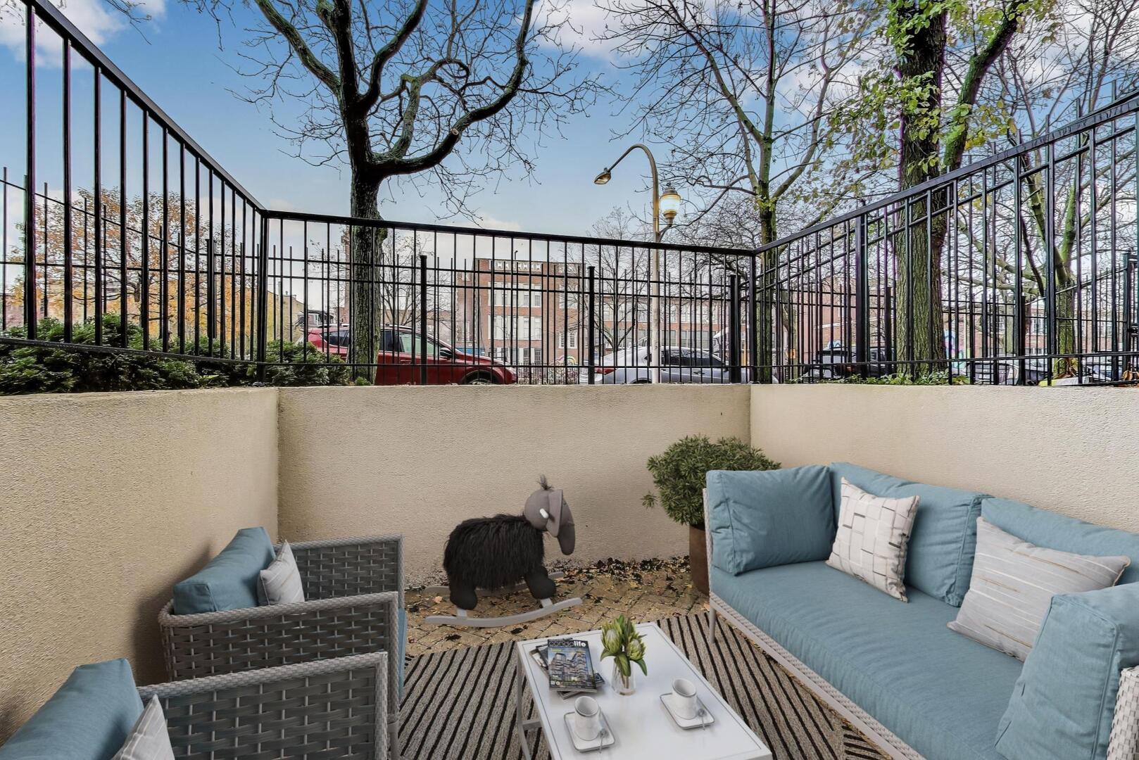 4432 North Dover Street, Unit 1S Chicago, IL 60640 - Photo 30 of 30 a living room with furniture