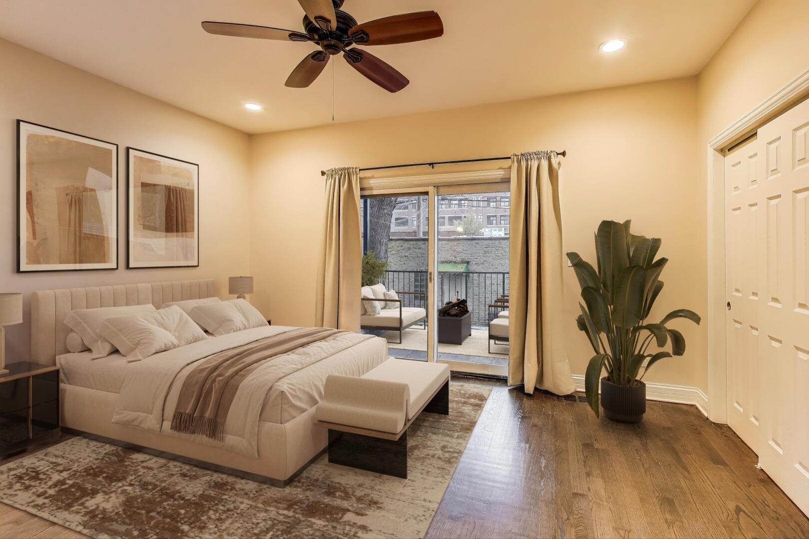 4432 North Dover Street, Unit 1S Chicago, IL 60640 - Photo 10 of 30 a bedroom with a bed couch and a window