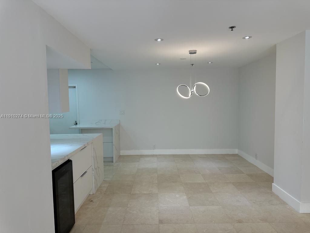 251 Crandon Boulevard, Unit 430 Key Biscayne, FL 33149 - Photo 9 of 19 a view of an empty room with a sink