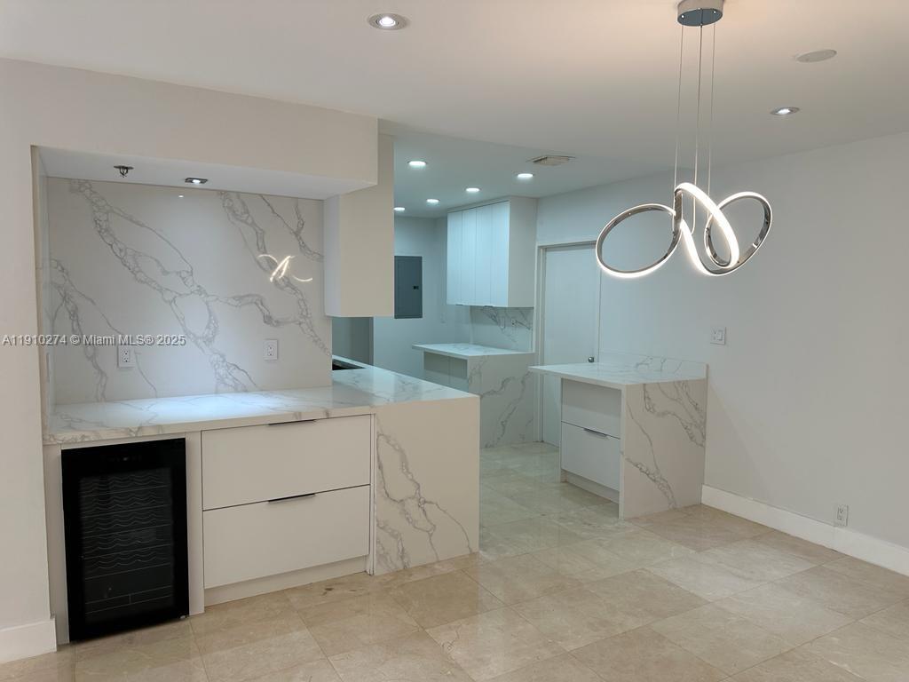 251 Crandon Boulevard, Unit 430 Key Biscayne, FL 33149 - Photo 10 of 19 a kitchen with cabinets and window