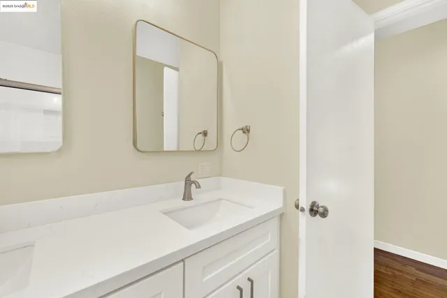 a view of balcony with wooden floor