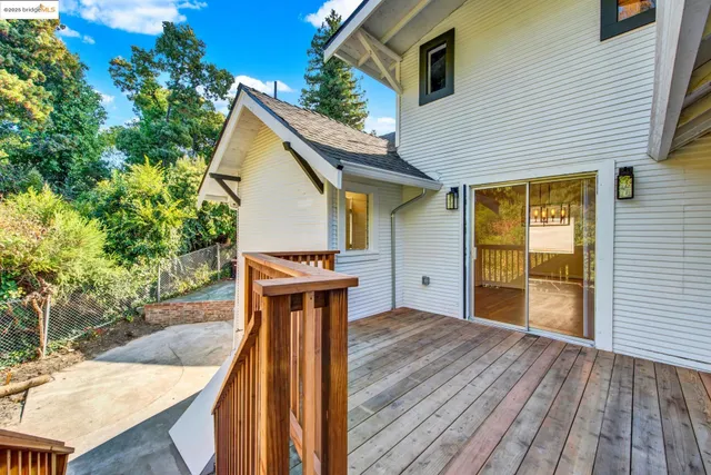 an aerial view of a house with outdoor space