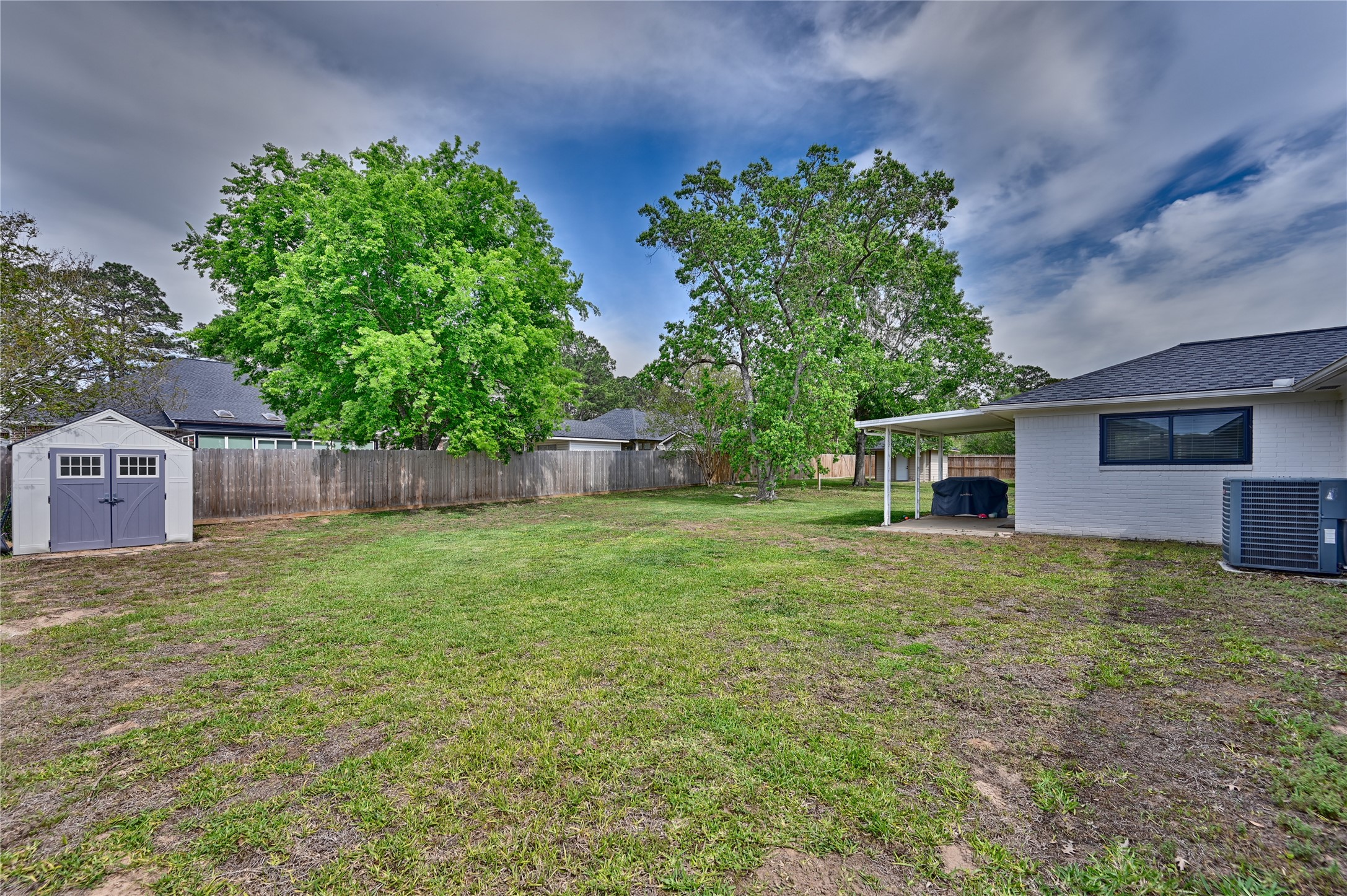 207 Briar Ridge Drive Bellville, TX 77418 - Photo 6 of 41 Backyard