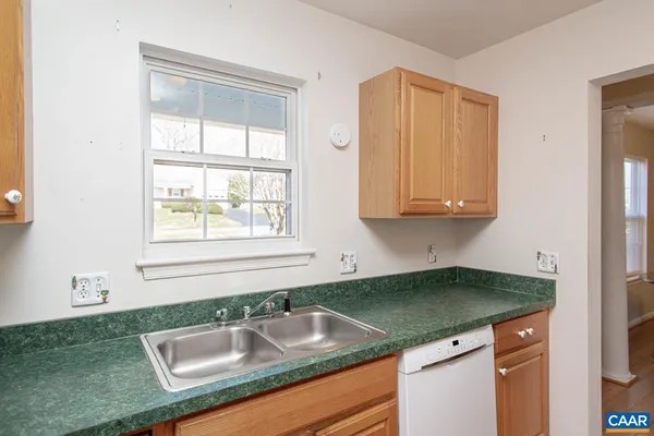 a kitchen with a stove and a refrigerator