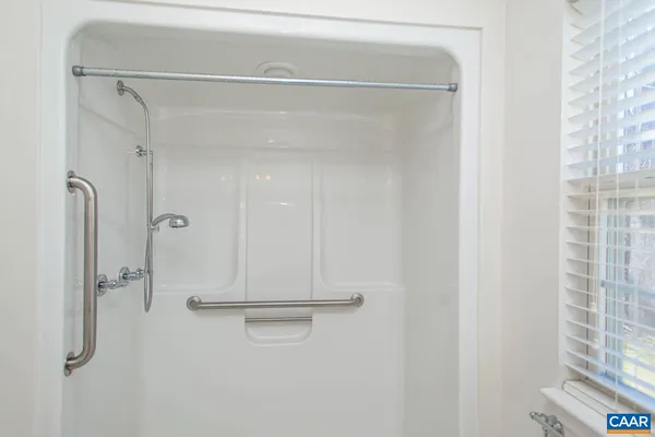 a view of a room that has a window