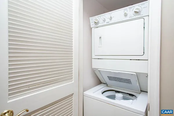 a bathroom with a sink toilet and mirror