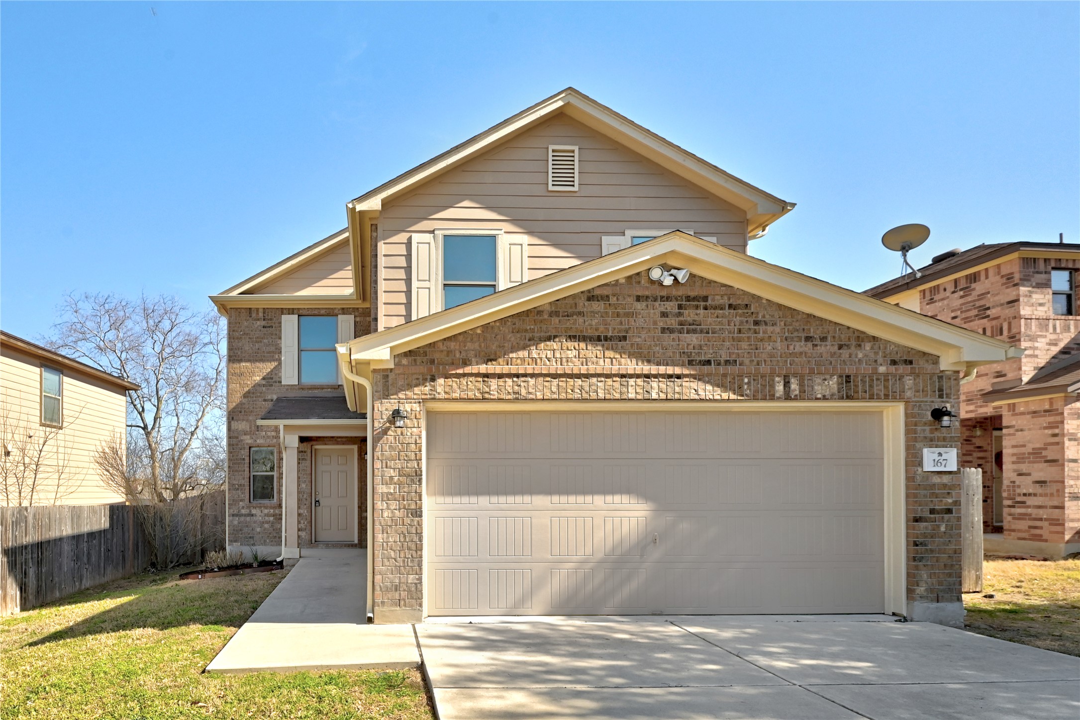 167 Rummel Drive Kyle, TX 78640 - Photo 1 of 1 a front view of a house with parking
