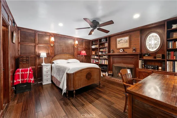 a bedroom with furniture and window