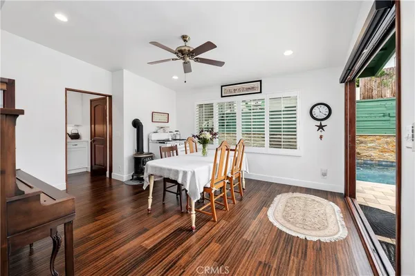 a bathroom with a sink a vanity and a mirror