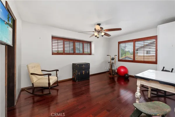 a view of a backyard with sitting area