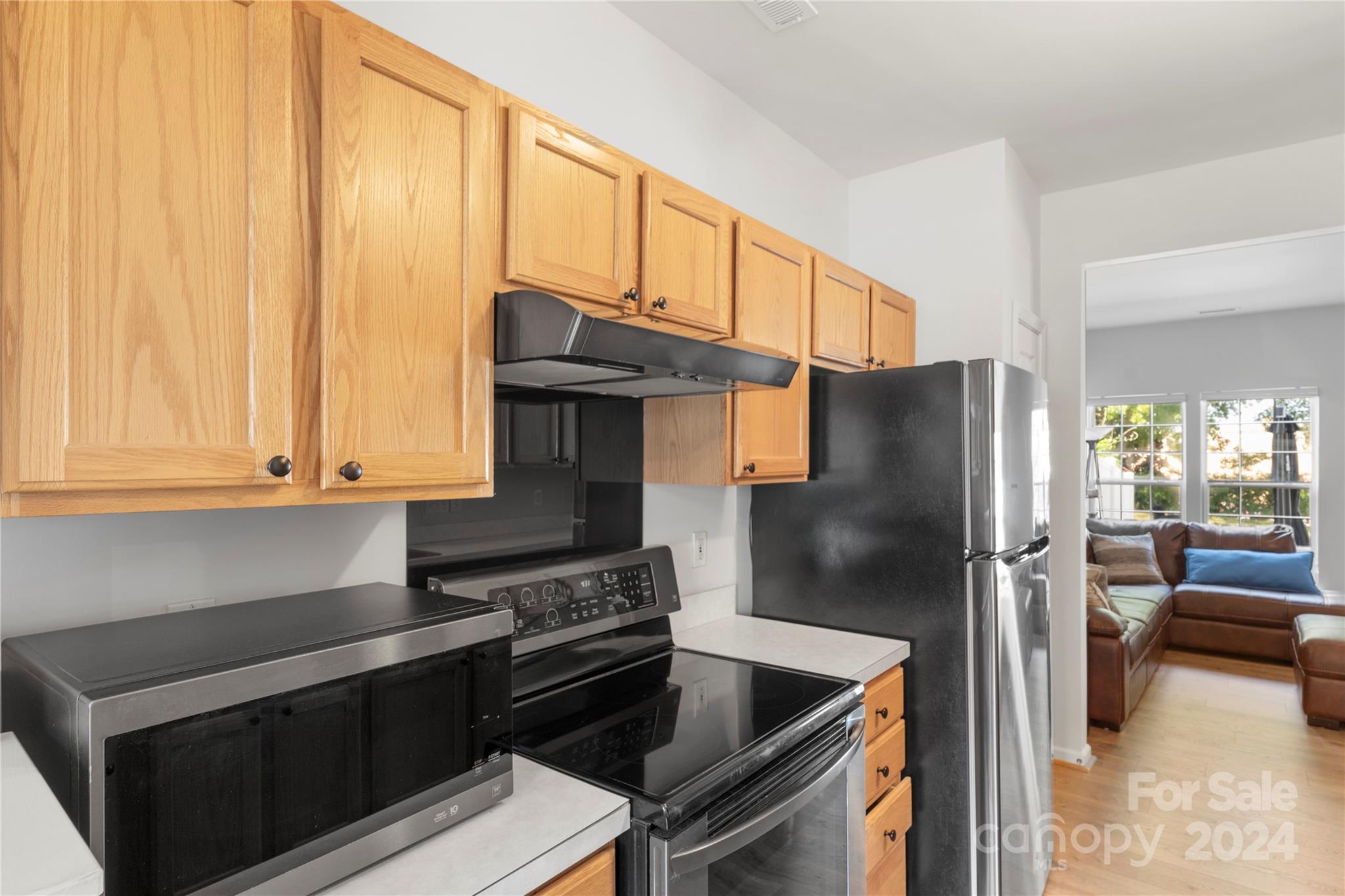 621 Atherton Way Rock Hill, SC 29730 - Photo 11 of 33 a kitchen with stainless steel appliances granite countertop a refrigerator and a stove top oven
