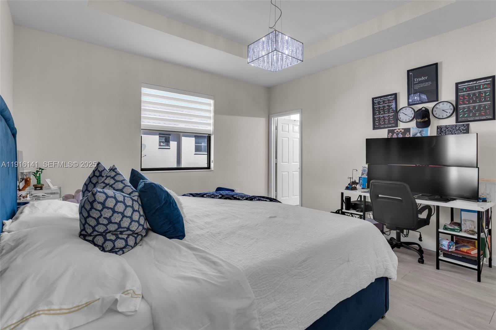 11413 Southwest 252nd Terrace Homestead, FL 33032 - Photo 27 of 40 a bedroom with bed and window