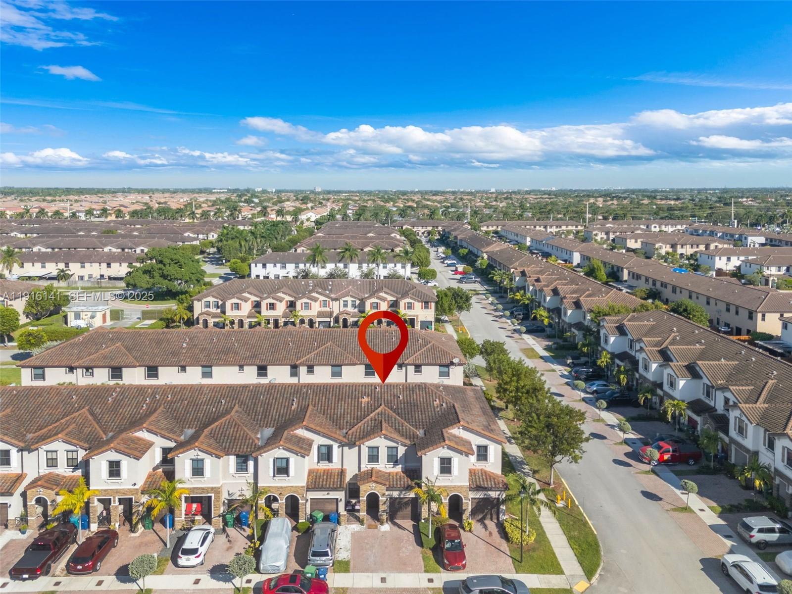11413 Southwest 252nd Terrace Homestead, FL 33032 - Photo 3 of 40 a view of a city with an ocean