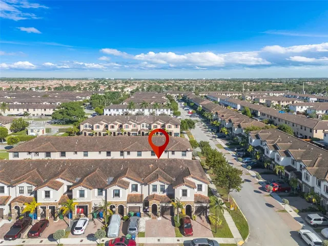a view of a city with an ocean