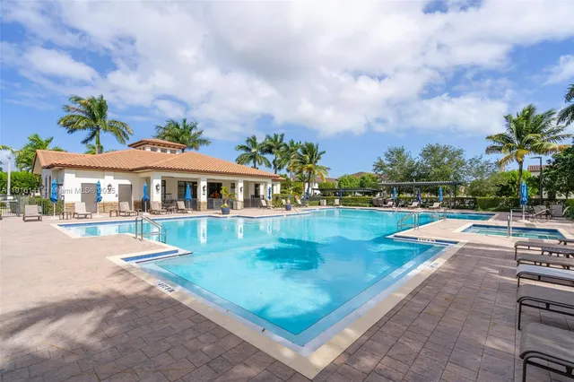 a view of a patio with a yard