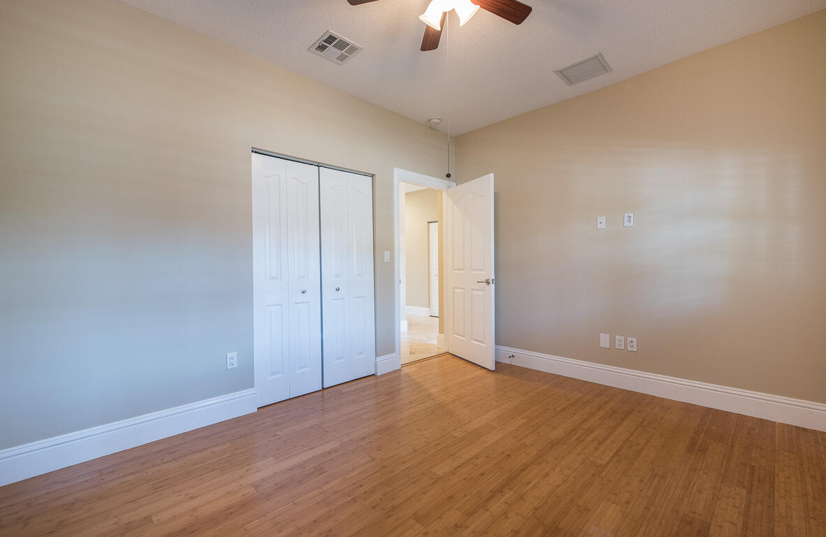 199 Northwest 7th Street Boca Raton, FL 33432 - Photo 19 of 37 wooden floor in an empty room