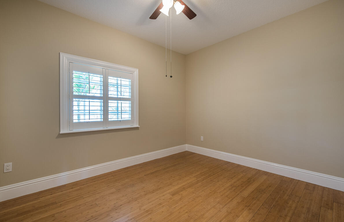 199 Northwest 7th Street Boca Raton, FL 33432 - Photo 20 of 37 an empty room with a window