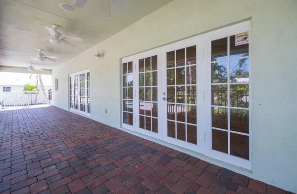 a view of empty room with windows