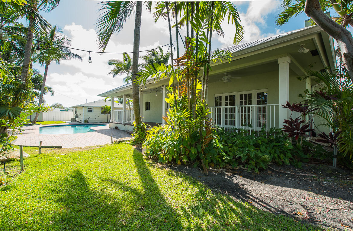199 Northwest 7th Street Boca Raton, FL 33432 - Photo 30 of 37 a view of a house with a yard