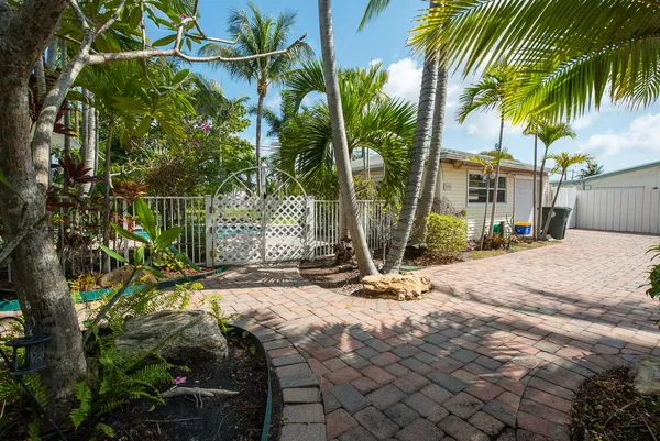 a view of a backyard with a patio