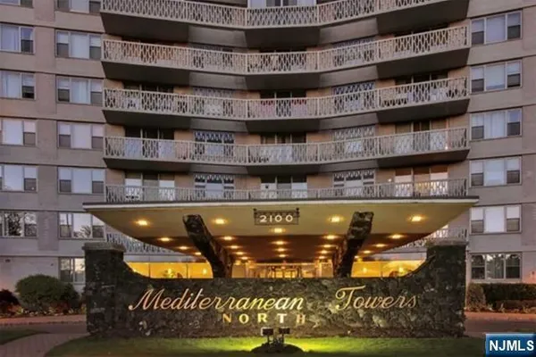 a view of swimming pool with building exterior