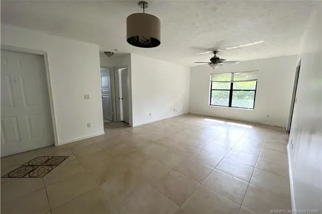 a view of entryway and kitchen