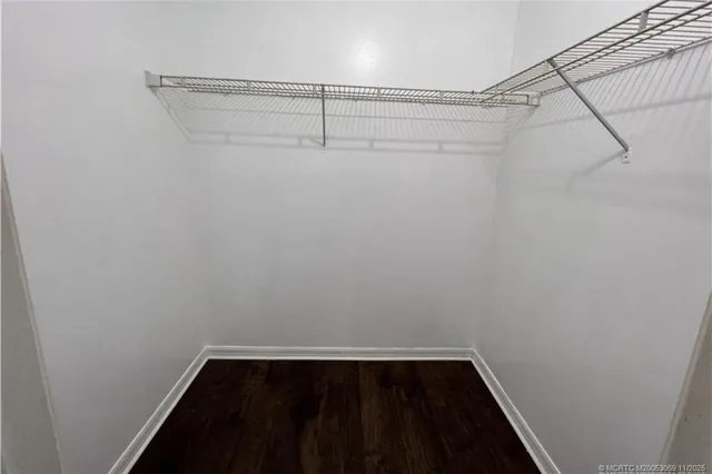 a view of a room with racks on the wall