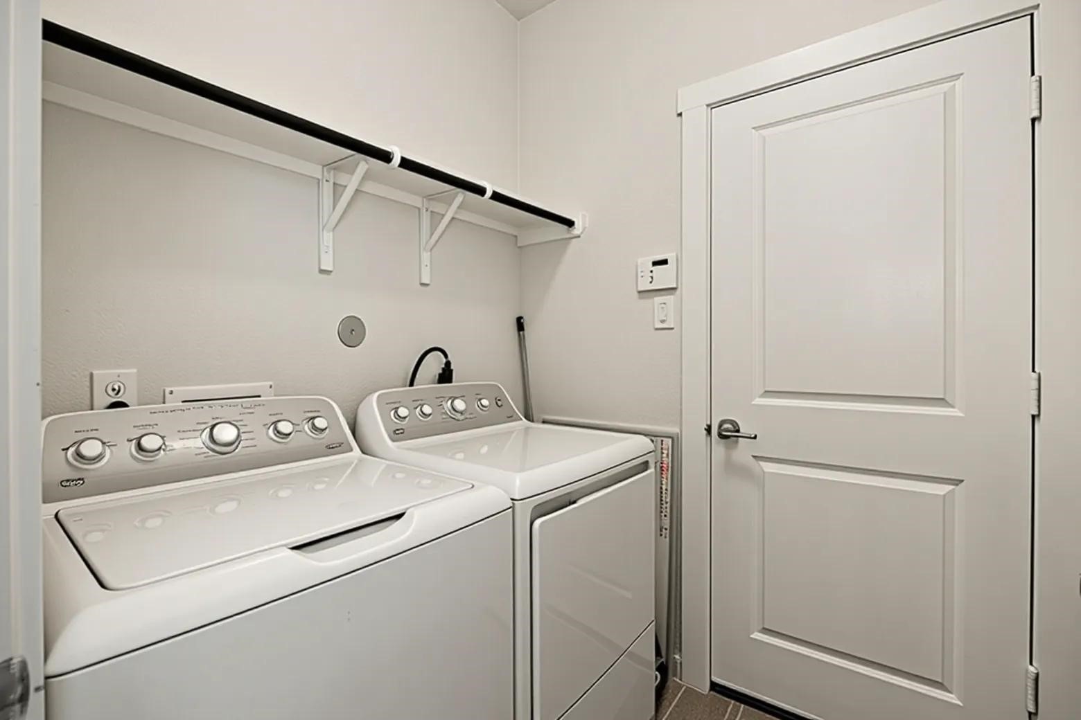 33142 School Hl Road Fulshear, TX 77441 - Photo 23 of 29 a utility room with dryer and washer