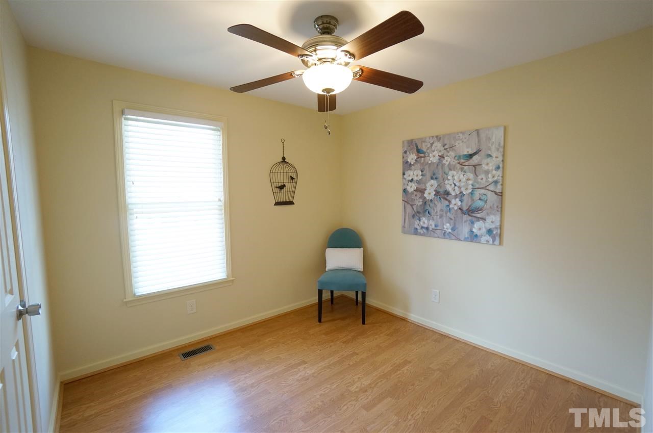 3413 Gemini Drive Raleigh, NC 27604 - Photo 8 of 16 a living room with furniture and a window