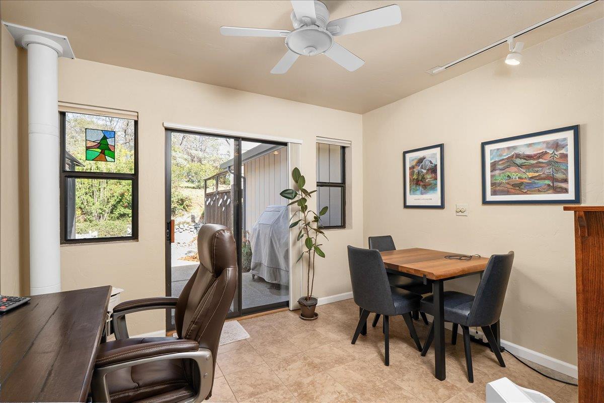 15666 Wolf Mountain Road Grass Valley, CA 95949 - Photo 23 of 78 a view of a dining room with furniture