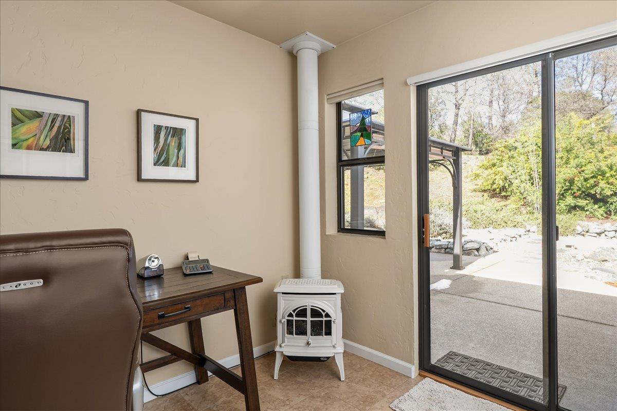15666 Wolf Mountain Road Grass Valley, CA 95949 - Photo 24 of 78 a view of workspace with furniture and window