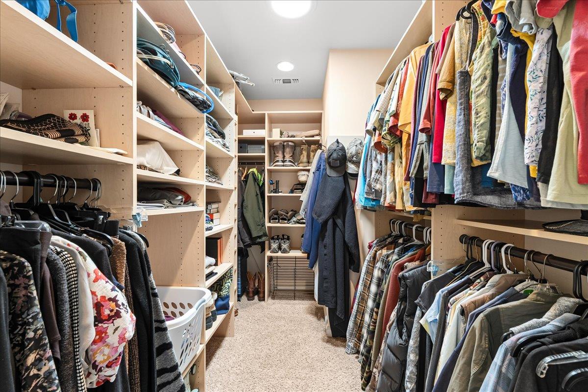 15666 Wolf Mountain Road Grass Valley, CA 95949 - Photo 30 of 78 a view of walk in closet with clothes and shoes
