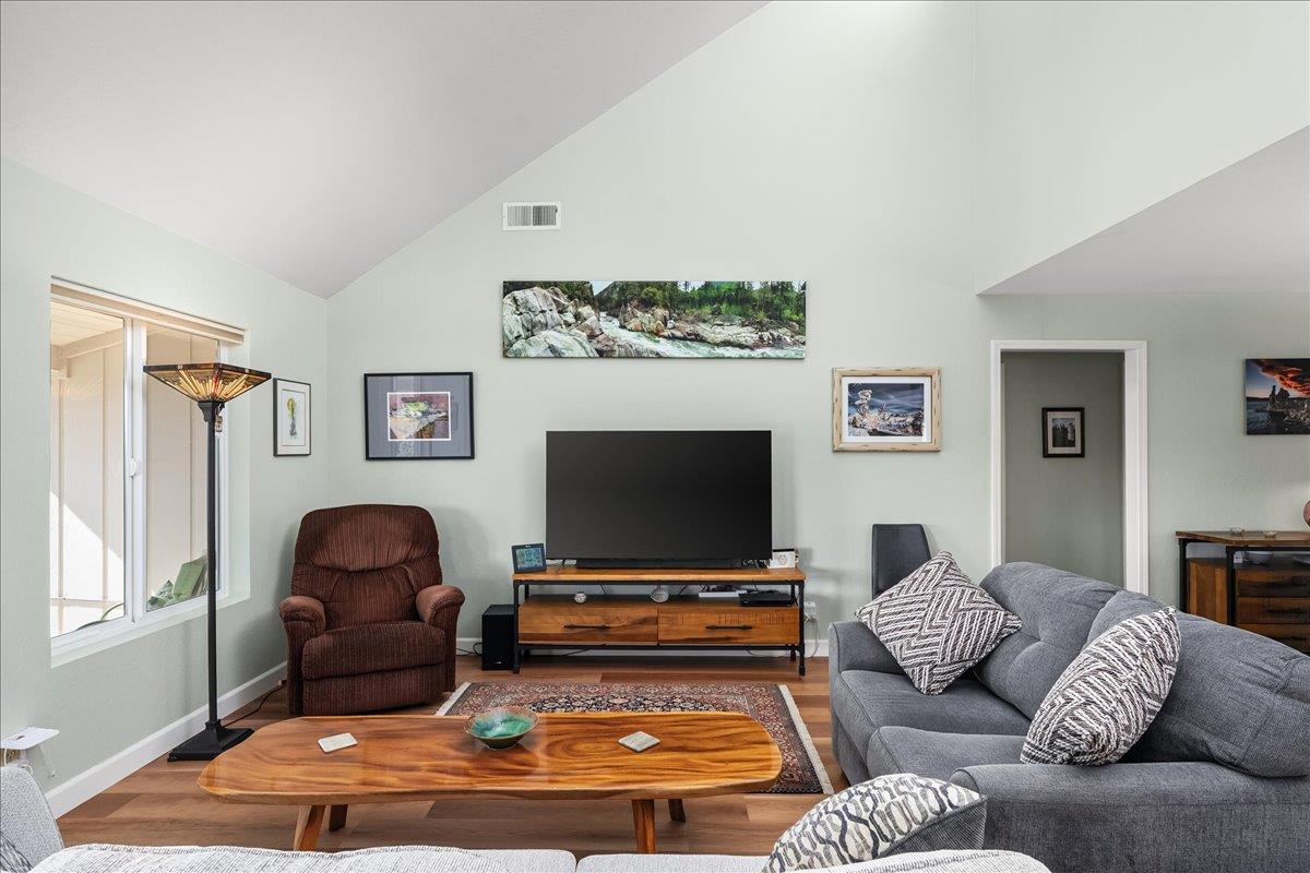 15666 Wolf Mountain Road Grass Valley, CA 95949 - Photo 3 of 78 a living room with furniture and a flat screen tv