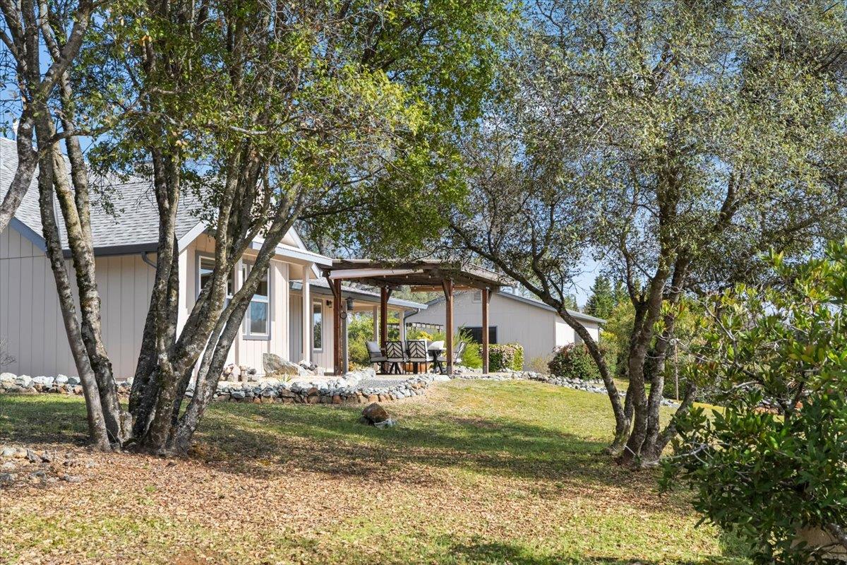 15666 Wolf Mountain Road Grass Valley, CA 95949 - Photo 59 of 78 a view of a house with a yard