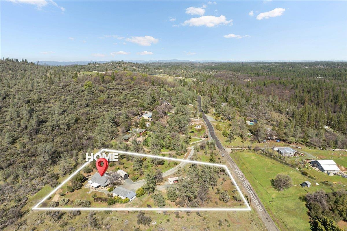 15666 Wolf Mountain Road Grass Valley, CA 95949 - Photo 71 of 78 an aerial view of residential houses with outdoor space