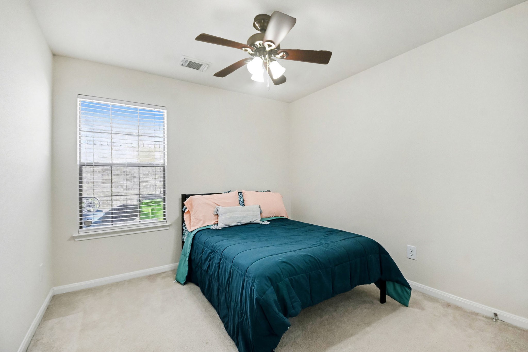 1318 Stevens Court Rosenberg, TX 77471 - Photo 24 of 32 a bedroom with a bed and a window