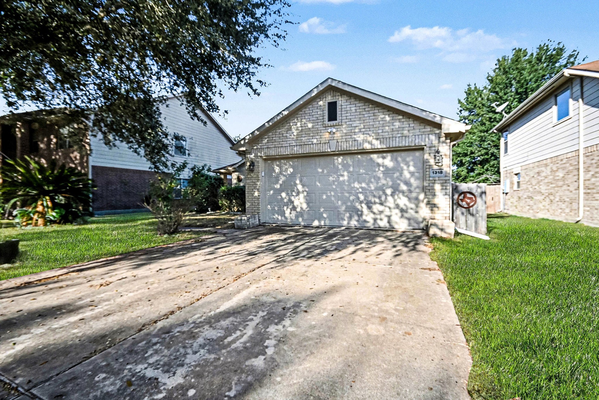 1318 Stevens Court Rosenberg, TX 77471 - Photo 3 of 32 a front view of a house with a yard